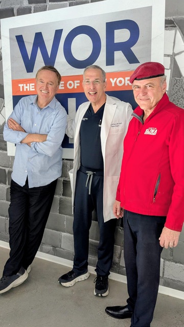Dr. Arthur Perry with fellow hosts at the WOR radio studios in New York