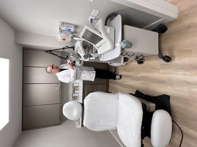 Staff preparing a treatment room at the Perry Plastic Surgery Center