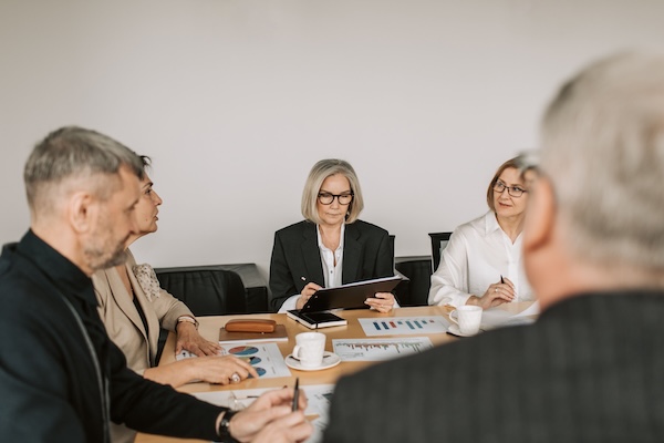 Independent consultant presenting findings to a client team in Singapore