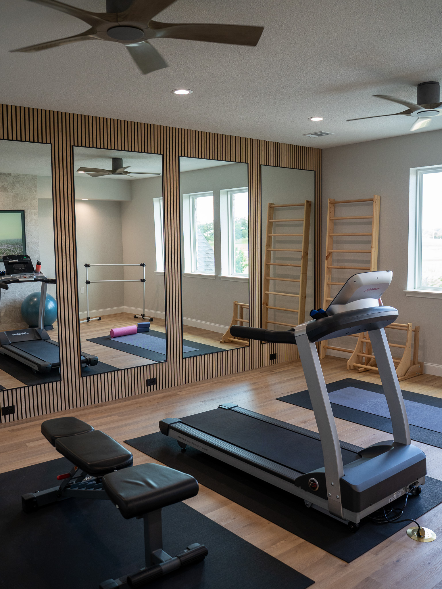 How We Converted a 20-Foot Open Ceiling Into a Split-Level Home Gym in Flower Mound