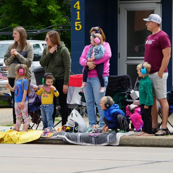 Family watches parade
