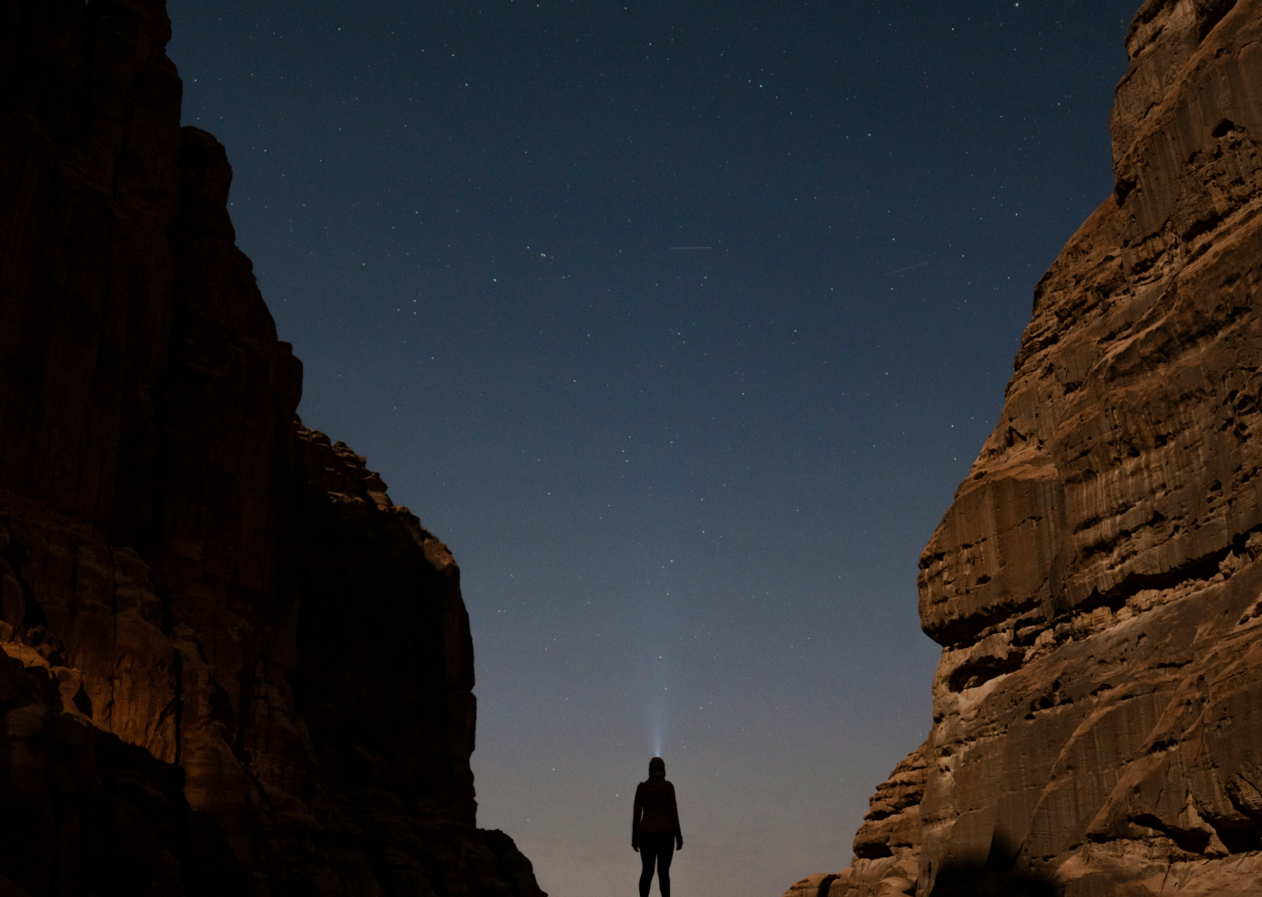 Trevor G Blake opening scene with man in middle of mountains