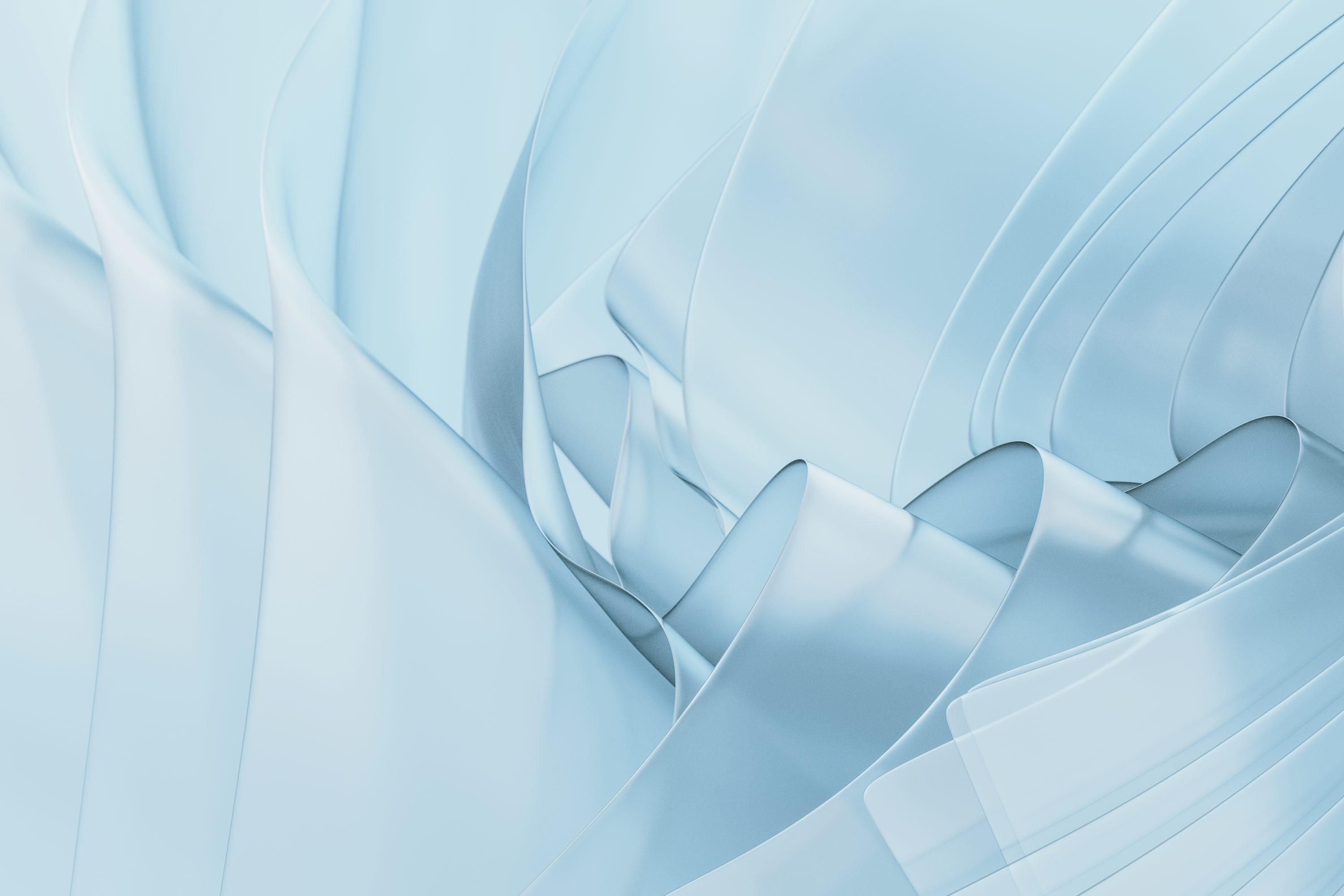 Swirling, light blue ribbons create an abstract design.