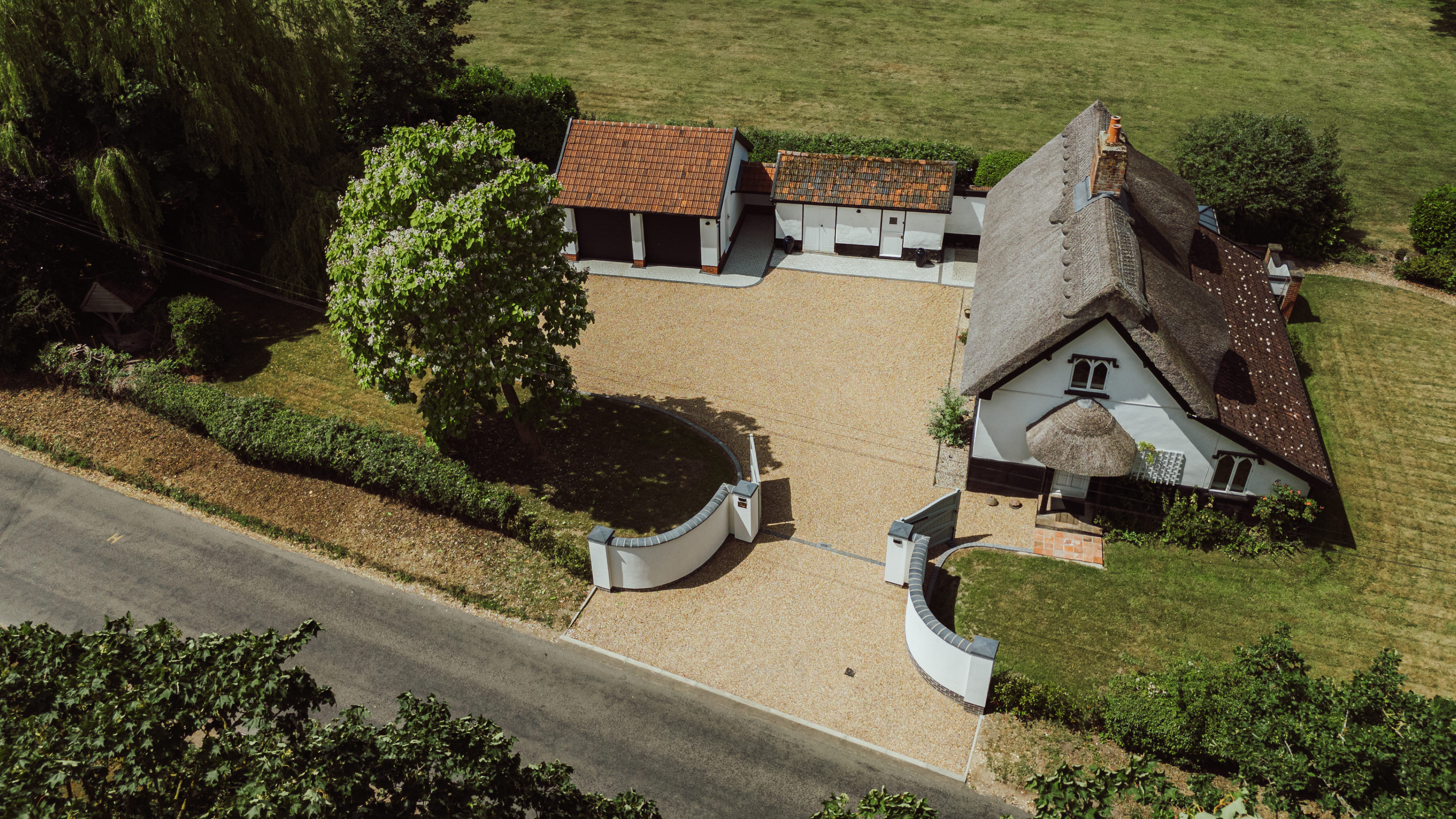 Ariel view of Church Cottage, You can see the newly installed Gravel Driveway and Curved walls constructed by JG Paving