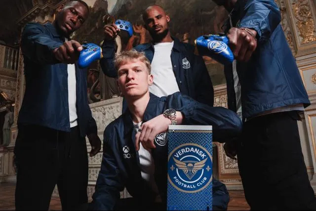 Joueurs de football du Verdansk FC avec des manettes de jeu.