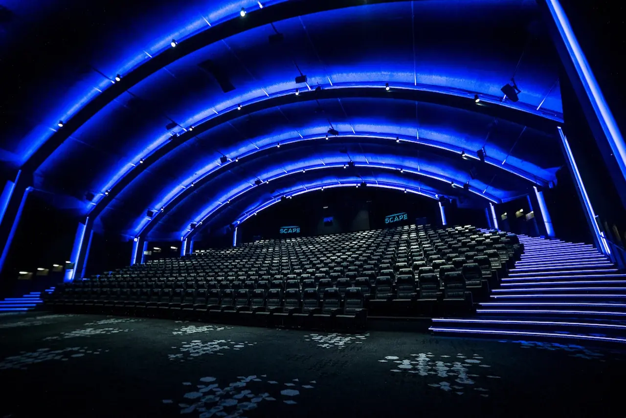 Large commercial cinema auditorium with blue cove lighting