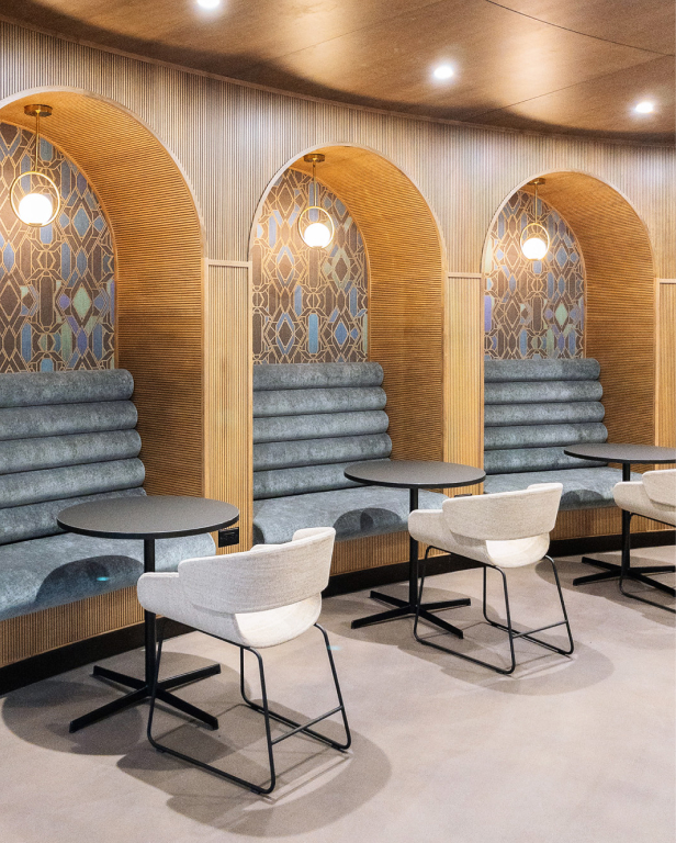 Consulting firm banquette seating area with archways