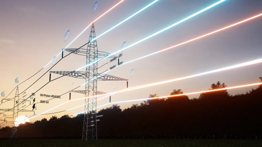 Electricity grid posts charged technology in front of sunset