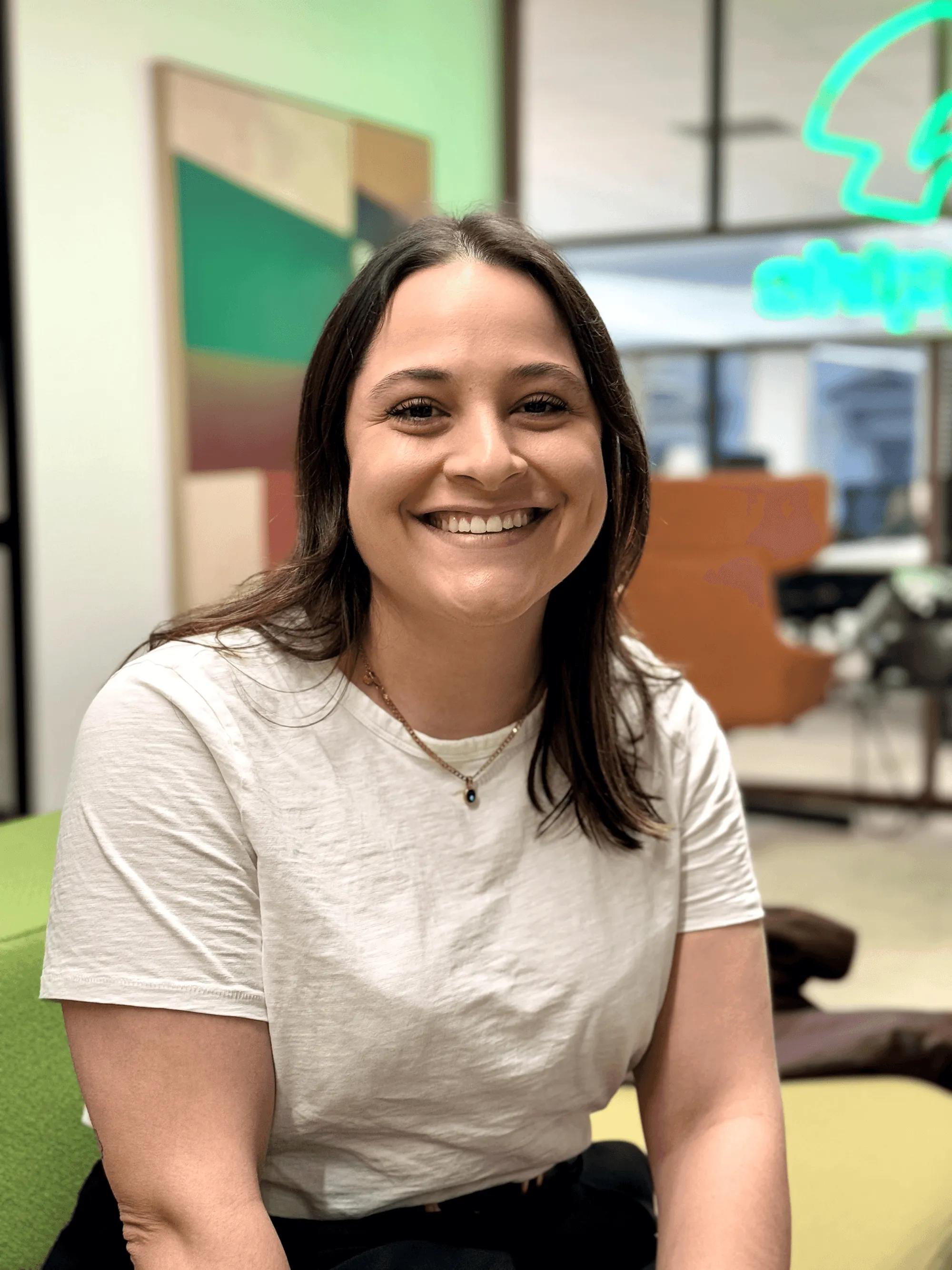 Woman smiling while seated