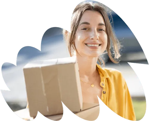 Woman smiling holding packages