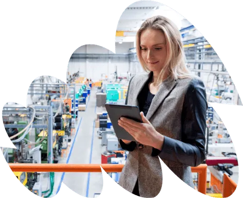 Woman looking at tablet in warehouse