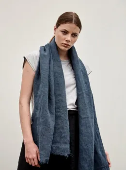 Woman wearing blue scarf
