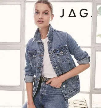 Woman sitting down wearing denim clothing