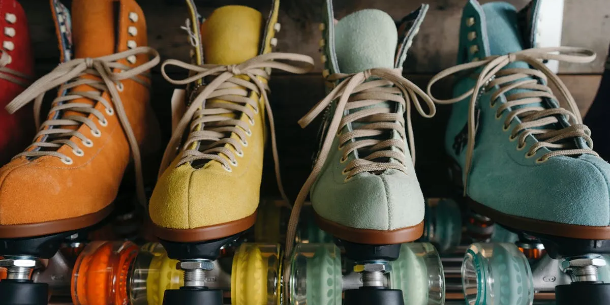 Four multi-coloured roller skates
