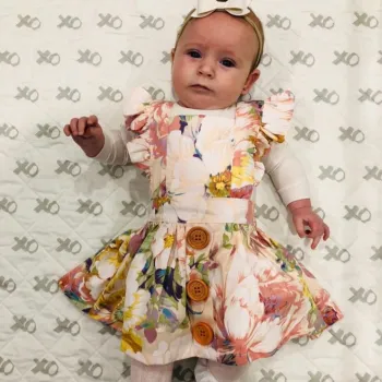 baby wearing dress