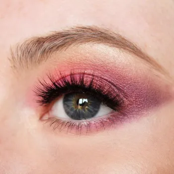Close-up of womans eye with makeup and eyeashes