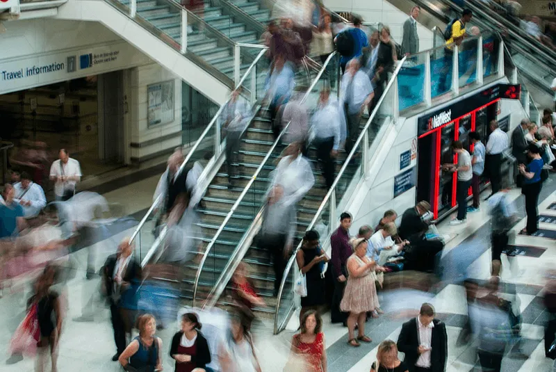 People walking around shopping centre