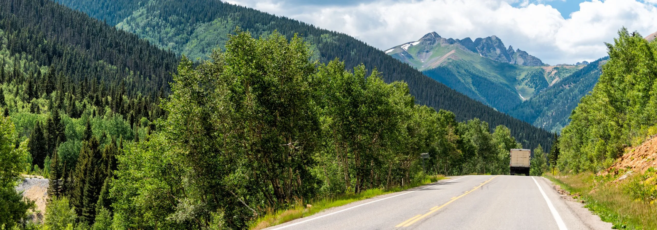 A road leading through a mountainous area