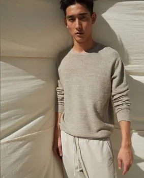 Man leaning on wall