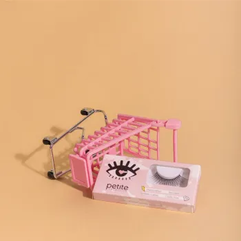 Small shopping cart tipped ver woth Petite beauty product