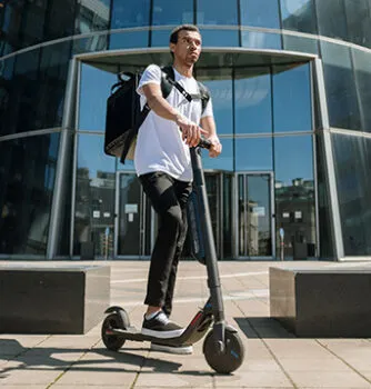Man riding electric scooter