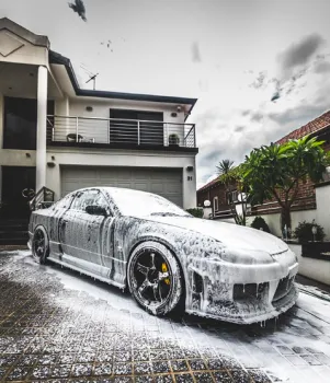 Car covered in snow foam