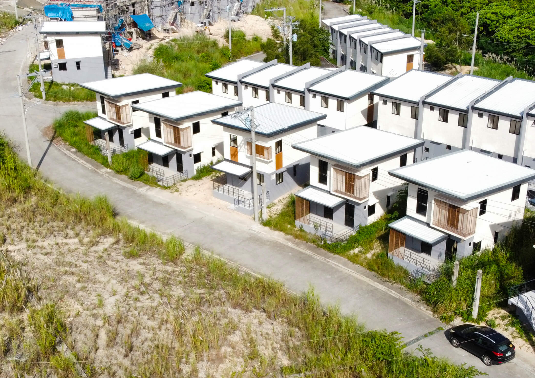 droneshot of houses in amoa subdivision compostela