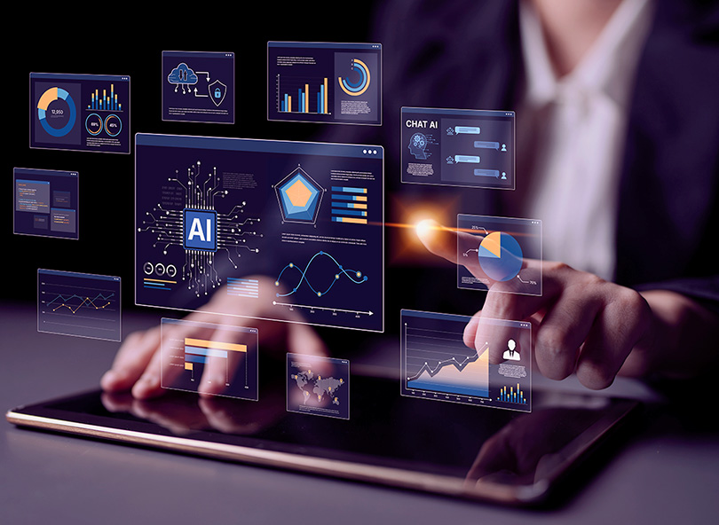Person using tablet with holographic AI analytics dashboards displaying data visualizations and charts
