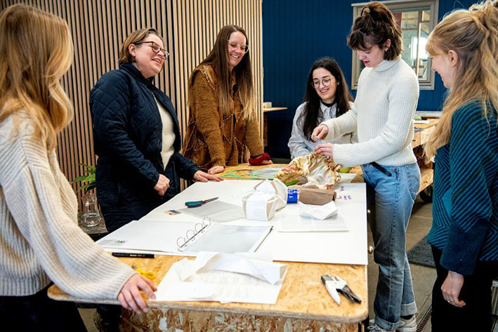 Colleagues provide sparring on what material the game should be designed in.