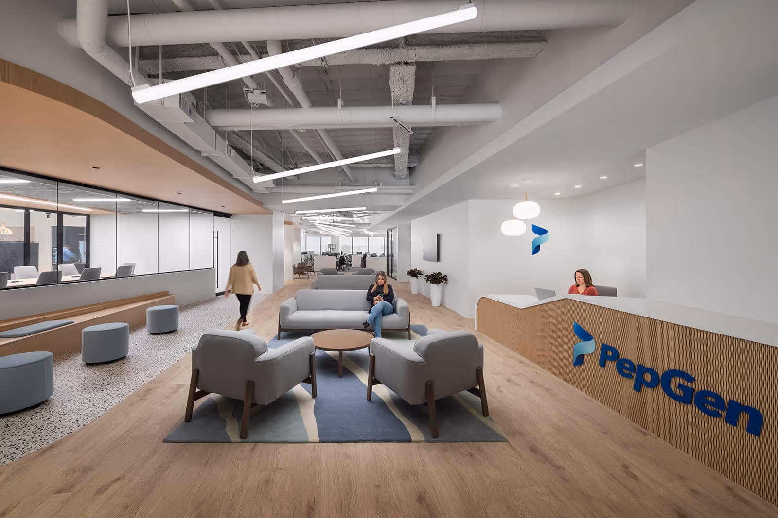 Modern PepGen office lobby with seating area and exposed ceiling