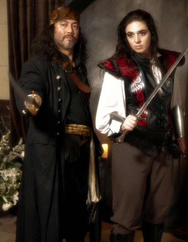A pirate and a lady knight immersive theatre character at The Paravelle Fantasy Ball Vanguard of Valor in Los Angeles at The Majestic Downtown