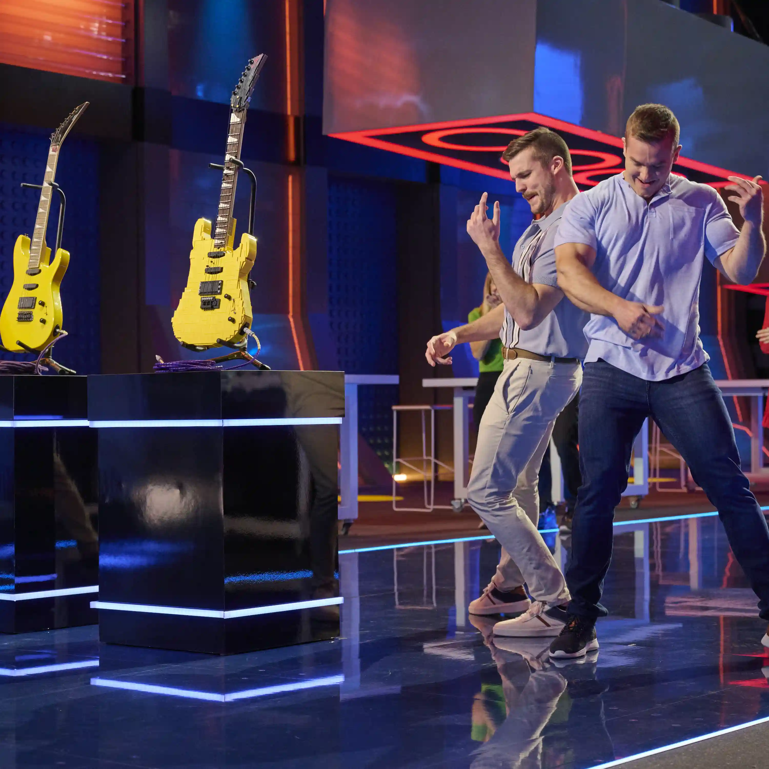 Ben and Michael rocking out on LEGO MASTERS with their Guitar Build