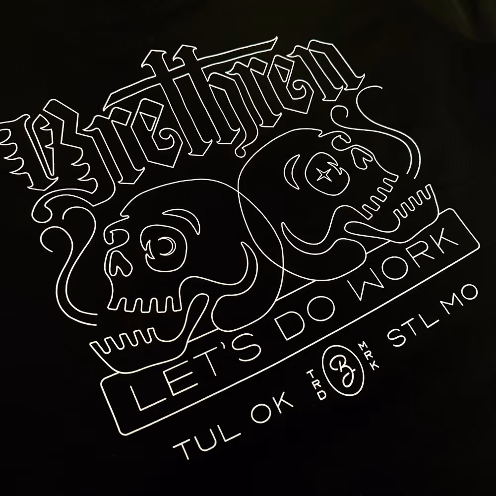 Brethren Design Co black t-shirt with skull and crossbones artwork and text "Let's Do Work."