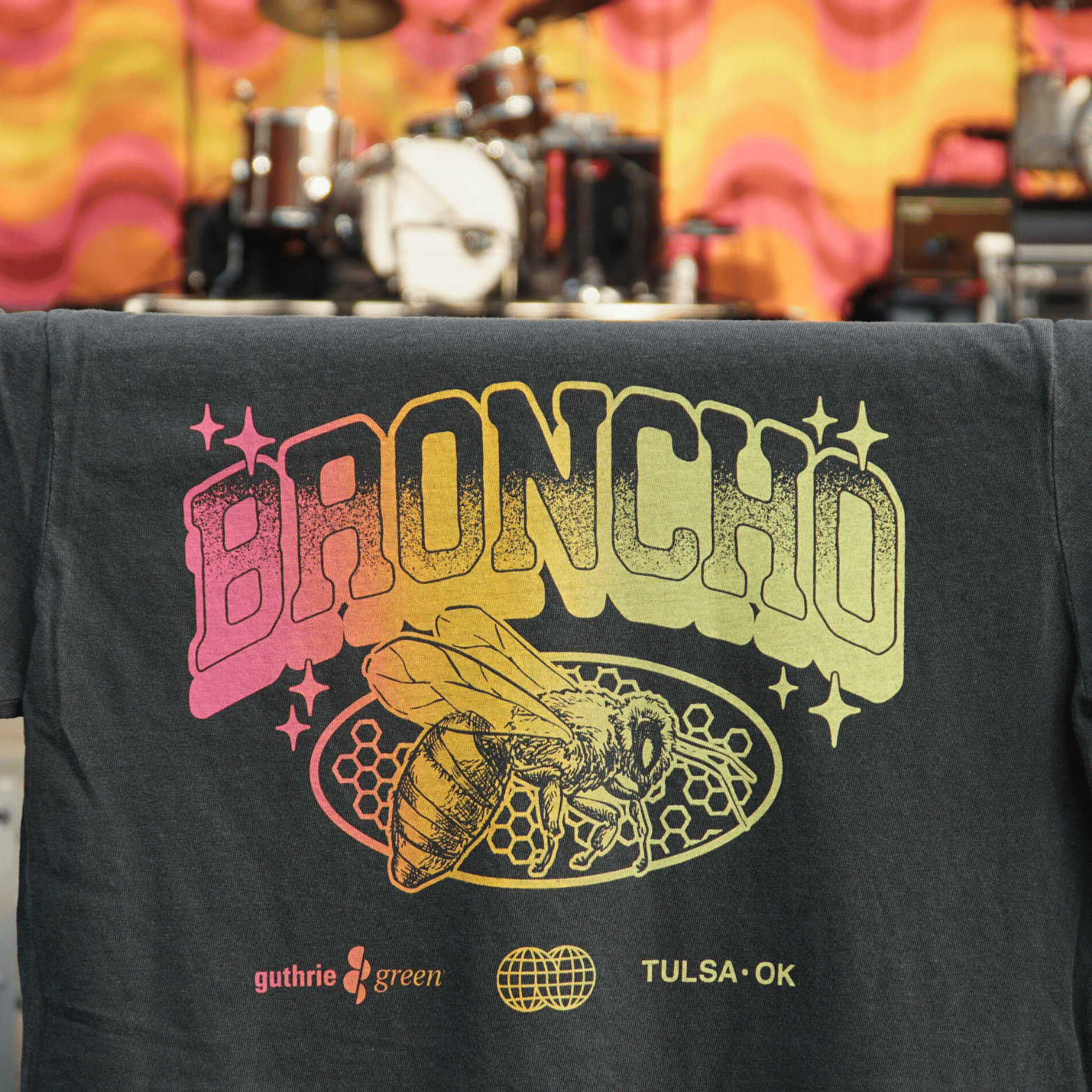 Broncho tshirt in front of a stage