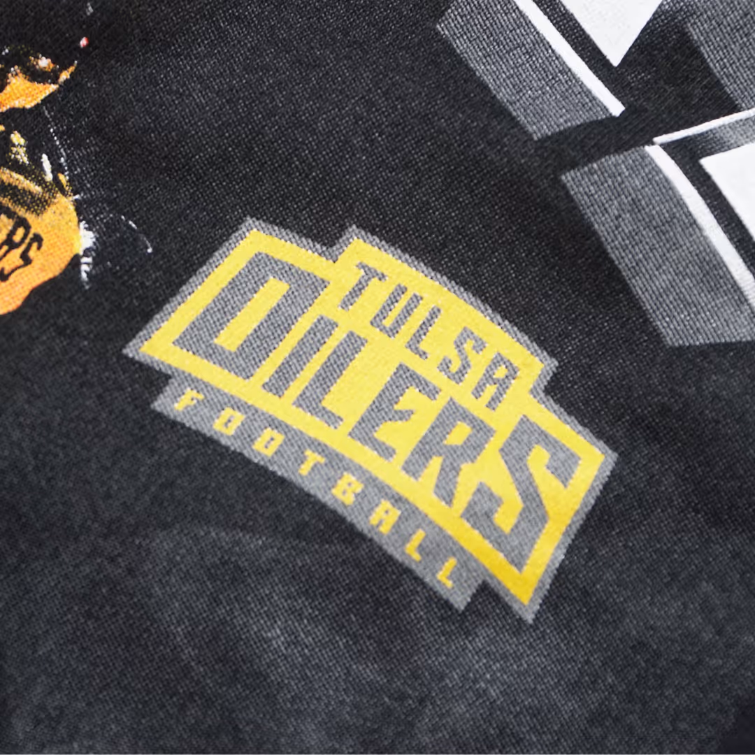 The Tulsa Oilers Football logo screen printed on a black shirt
