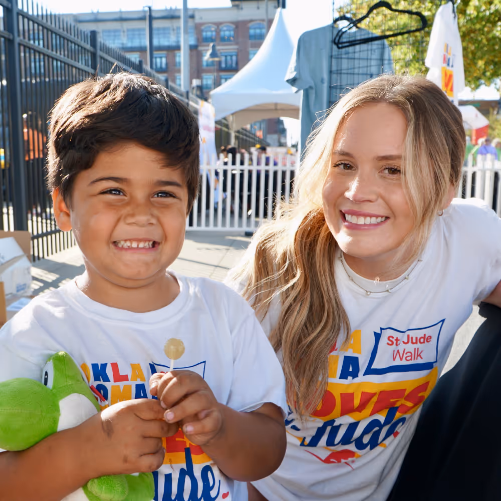 A young boy and his mom wearing St. Jude tshirts