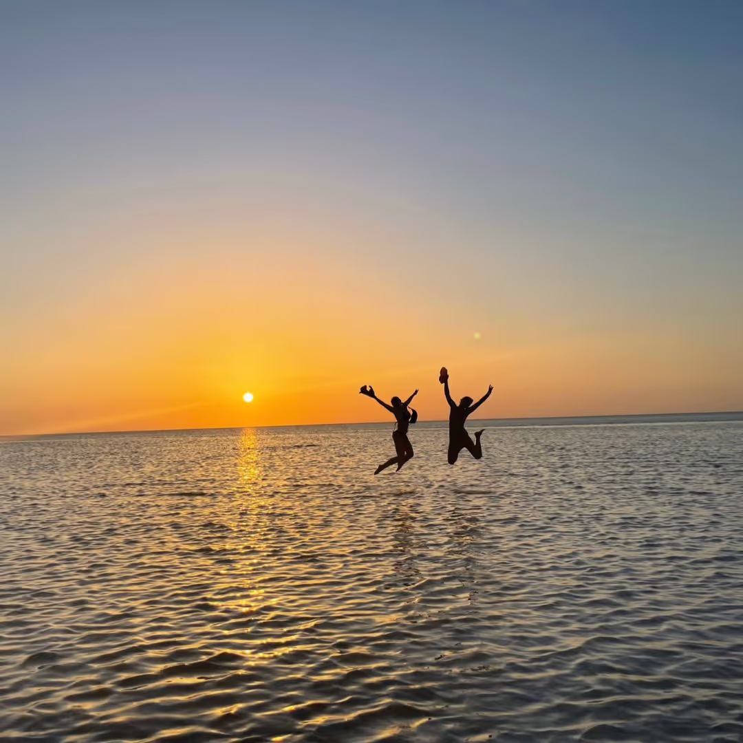 2 Girls leaping into the sea on a gap year adventure to Costa Rica with The Leap