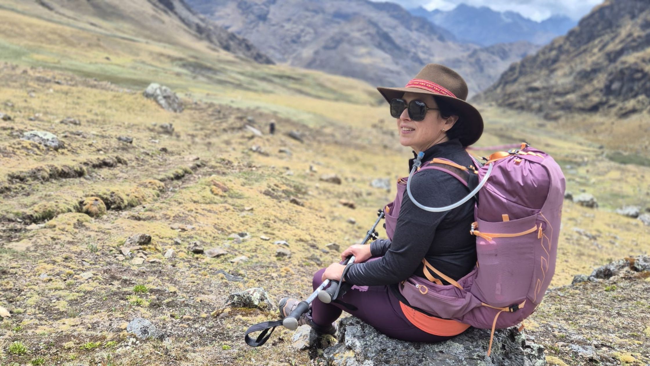 four midlife women on a solo holiday sitting in a vehicle