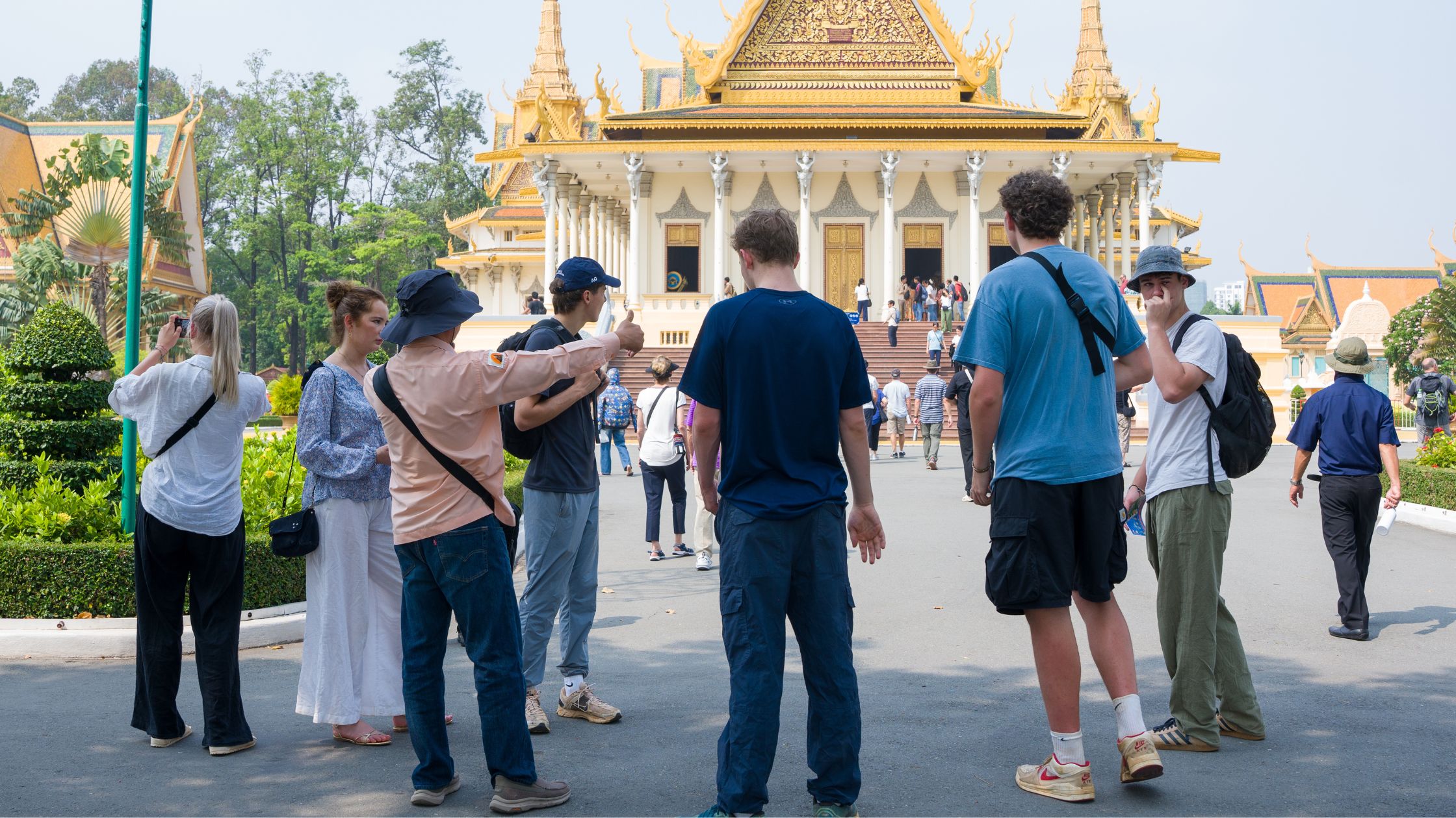Gap year students in Cambodia with a guide