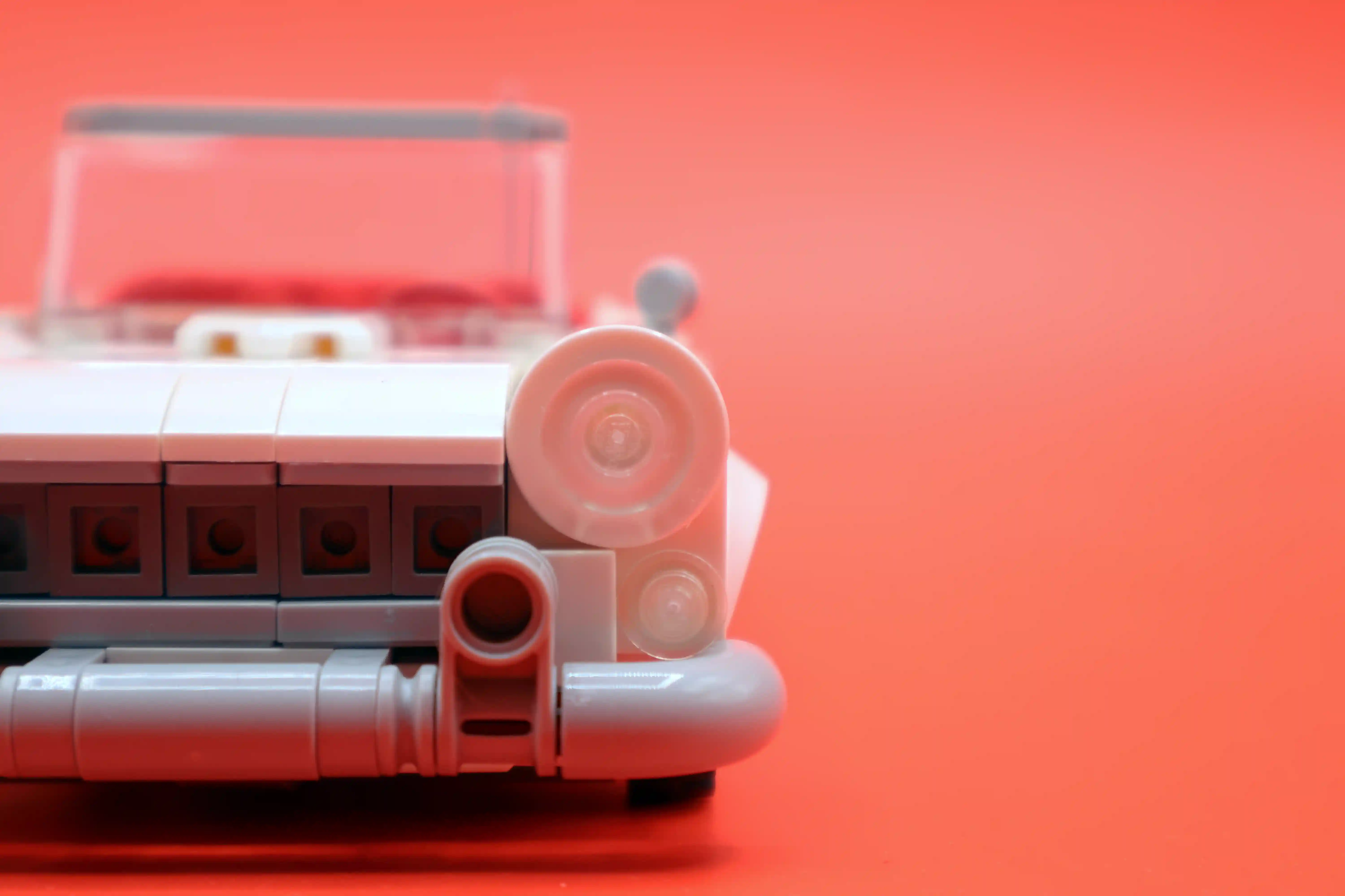 A custom LEGO commission by Ben Brickson of a white 1955Ford Thunderbird