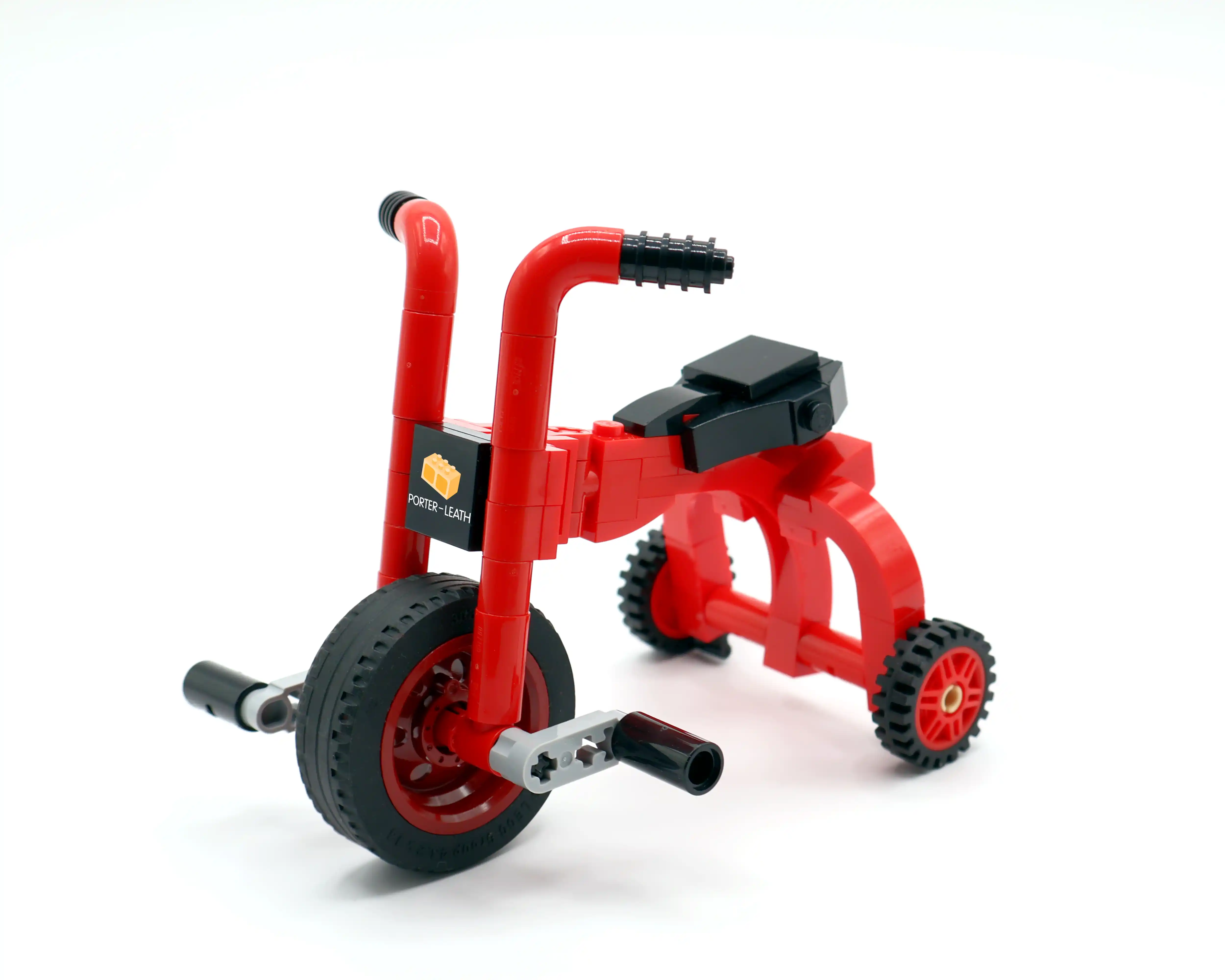 A red tricycle created by Ben Brickson in association with EclipseGrafx