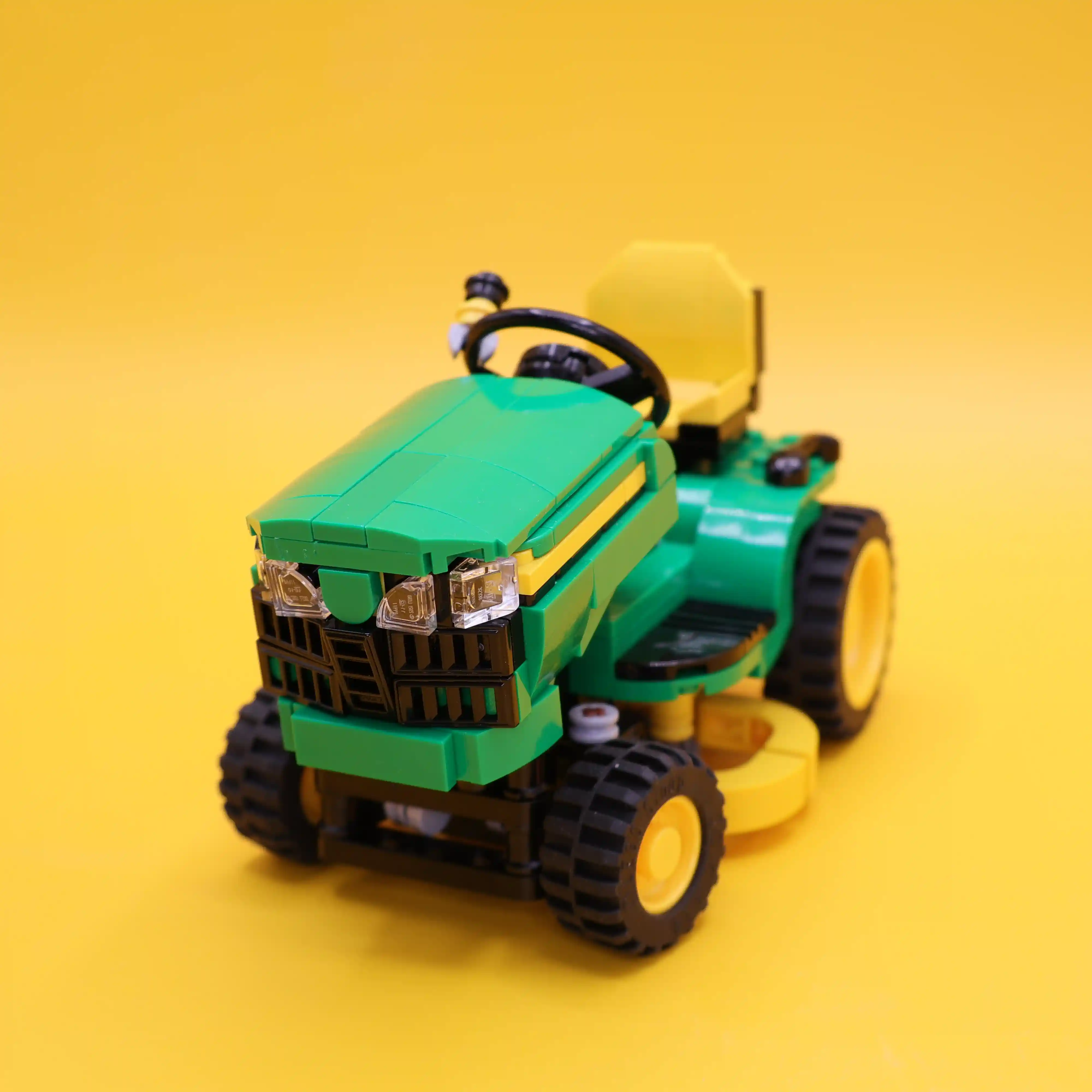 A custom LEGO commission by Ben Brickson of a John Deere riding mower
