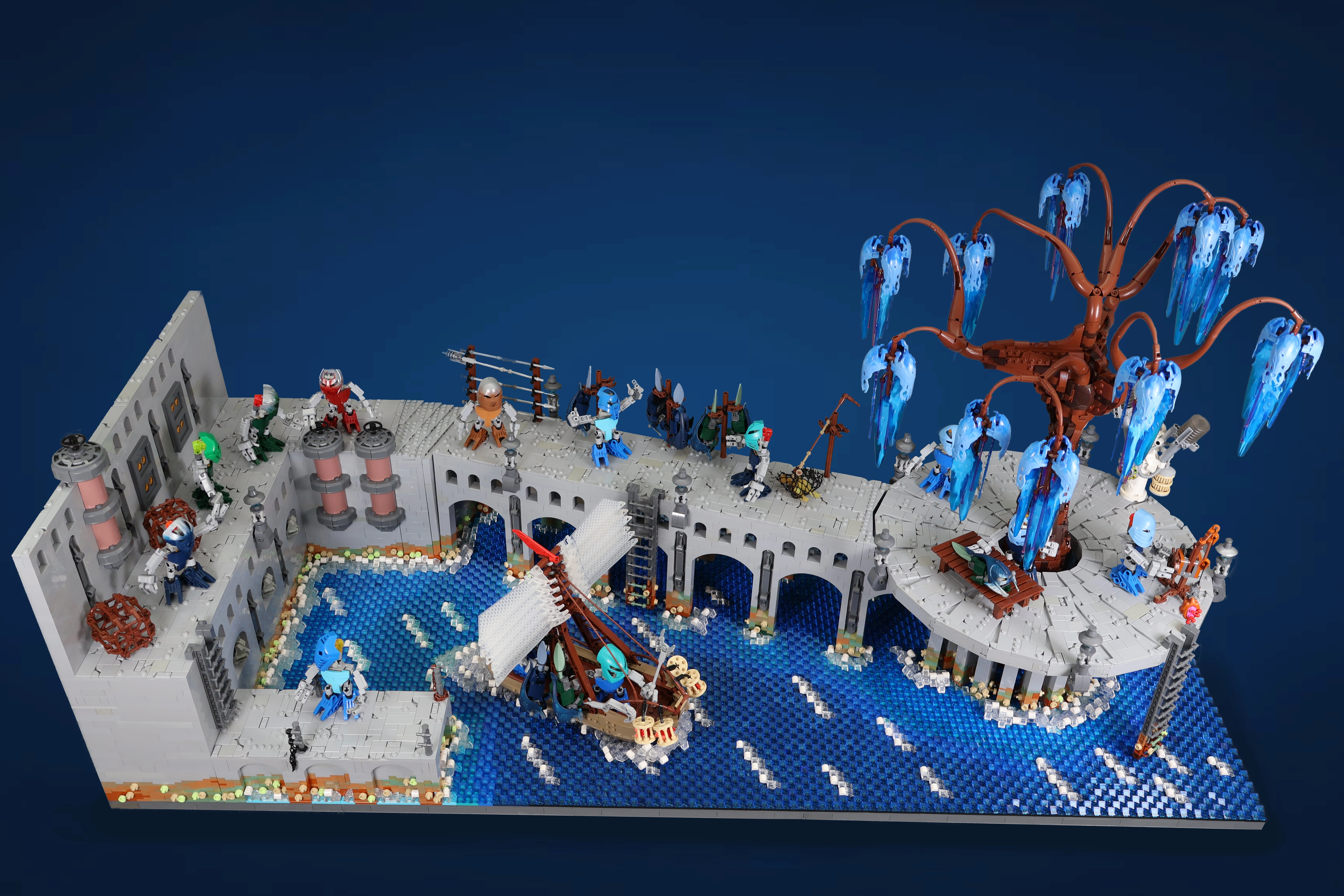 Located at the docks of Ga-Metru, life along the coastal city flourishes with bustling trade underneath a ritualistic tree.