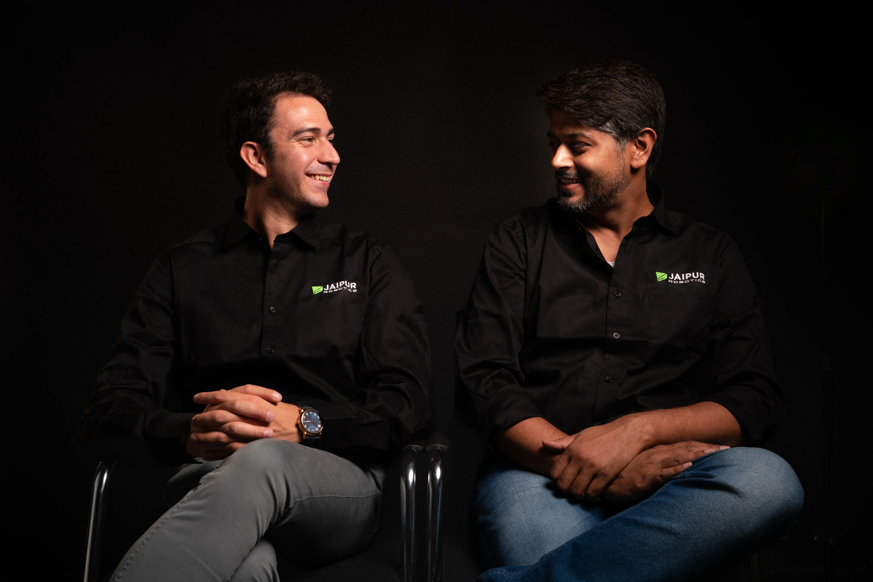 Jaipur Robotics co-founders Ermes Zamboni and Nikhil Prakash seated side by side