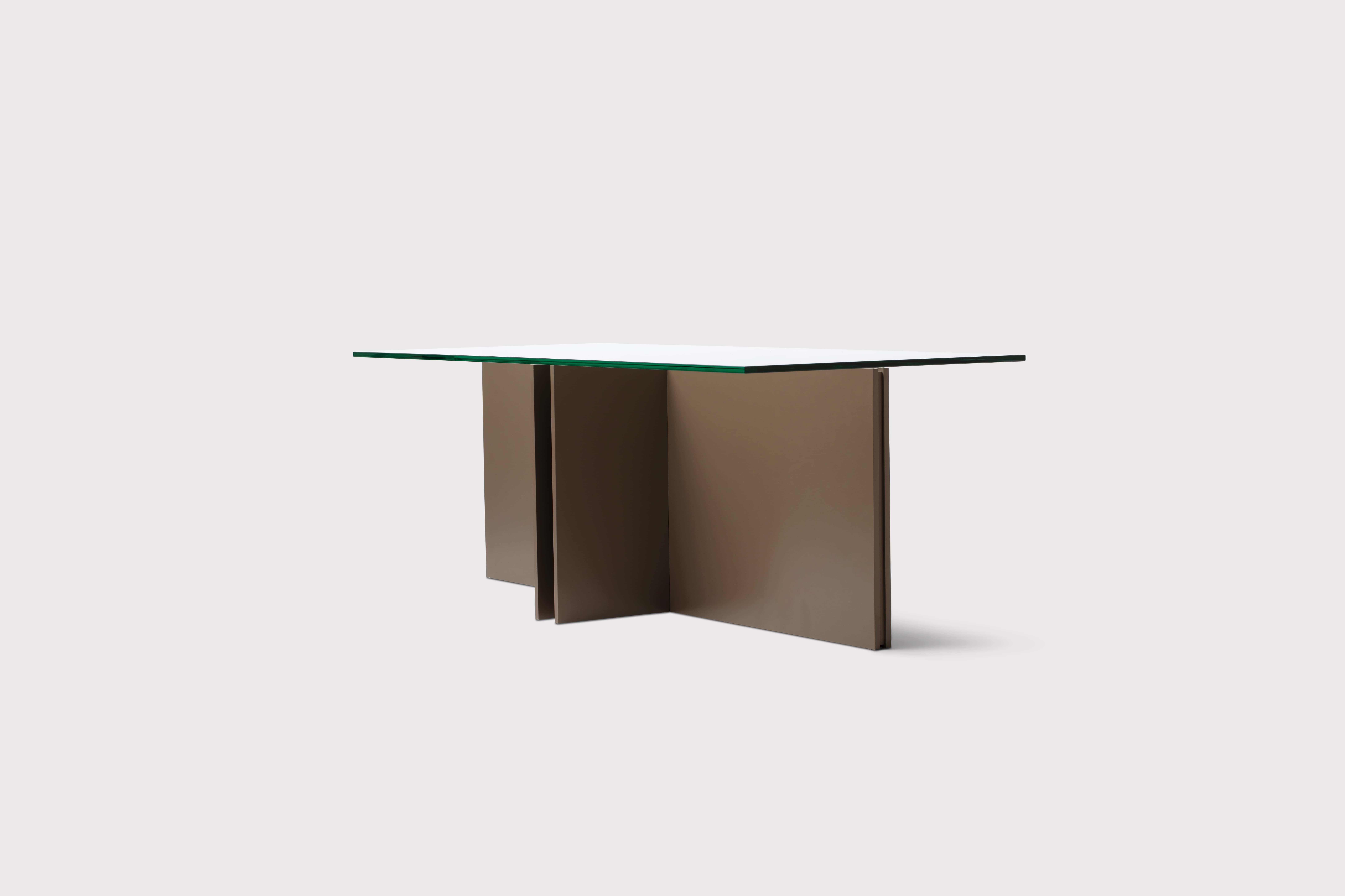 Confident, clean lines and contemporary taste deliver a range that is both aesthetically pleasing and practical. The interlocking shapes are based on essential forms and simplified construction. Designed to be flat-packed, the table can be assembled without the use of tools or hardware.