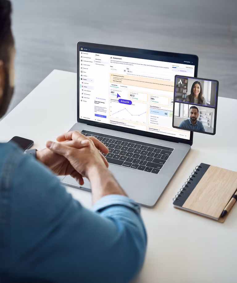 Person participating in a video conference on a laptop displaying performance analytics dashboard with charts and metrics.