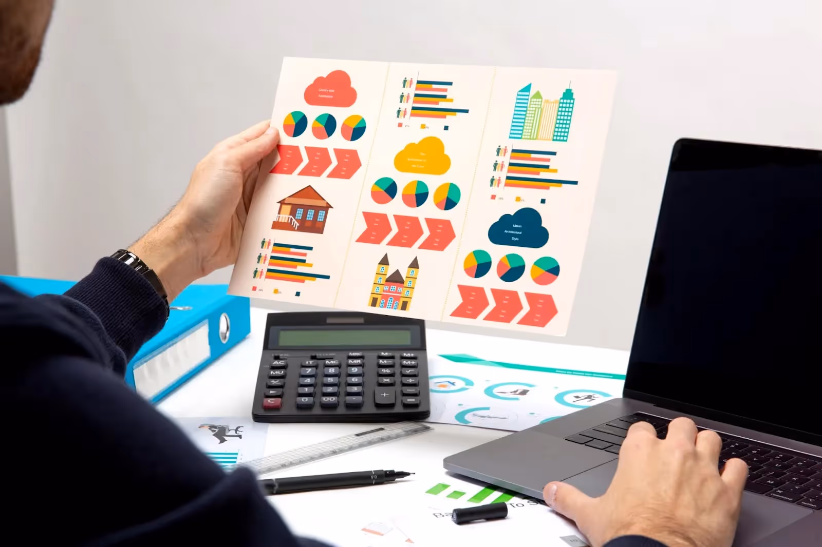 Person analyzing customer loyalty program data and ROI metrics using colorful infographics and a calculator