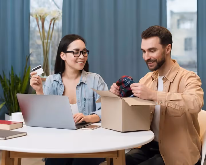 A couple enjoying an online purchase unboxing experience, showcasing loyalty rewards and customer satisfaction