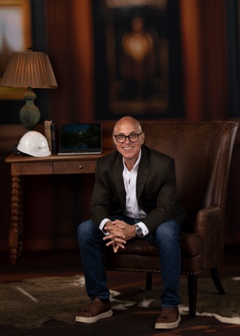 In Pharr, Texas, Oscar Elizondo discusses roofing services and construction expansion