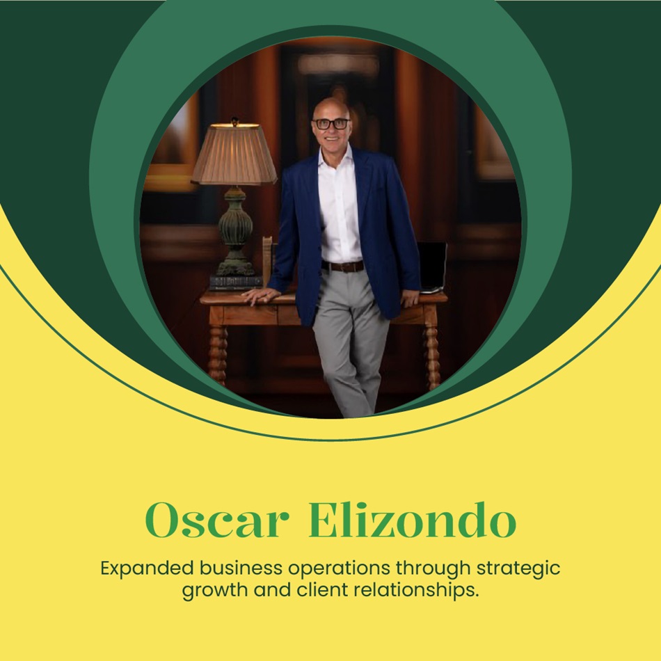 Oscar Elizondo standing near desk wearing formal blue blazer
